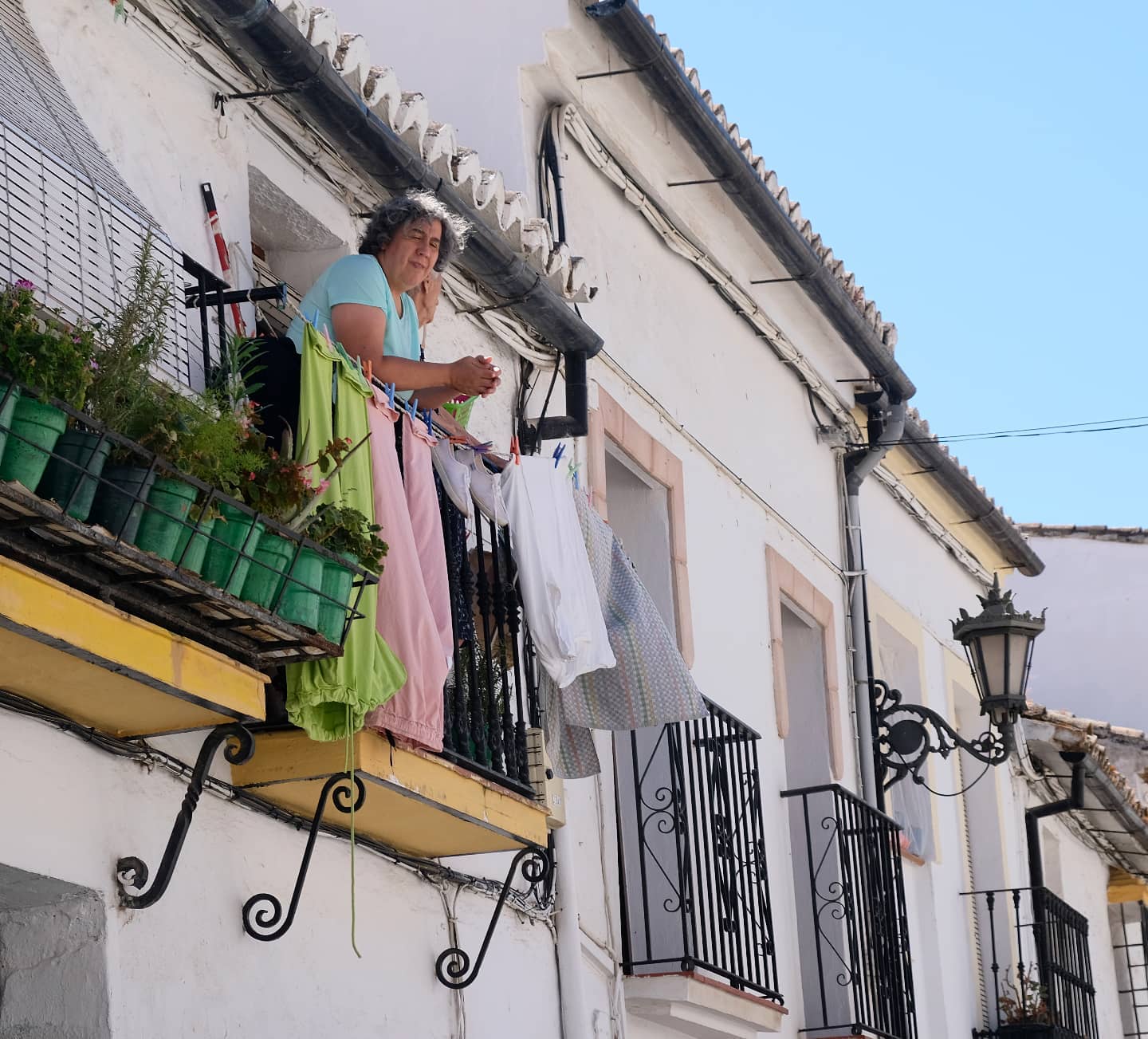 A picture of a Woman in balcony